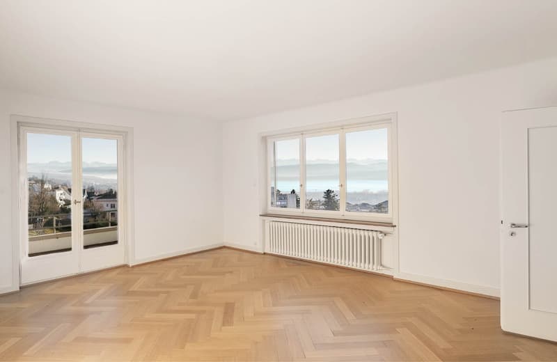 large windows, balcony, parquet floor, radiator