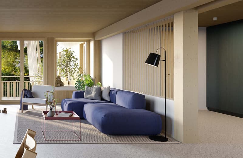 Spacious living room with large windows, blue sectional sofa, coffee table, floor lamp, and potted plants