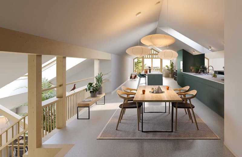The image shows an open concept living, dining, and kitchen area with a modern and minimalist design. The space features high ceilings, large windows that provide natural light, and a wooden dining table with chairs. The kitchen area has green cabinets an