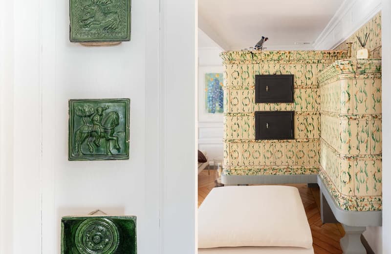 white walls, green tiles, fireplace, decorative tiles, white cushion