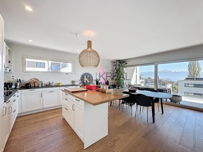 Cadre de vie privilégié : 4,5 pièces moderne avec balcon et vue exceptionnelle sur le lac (4)