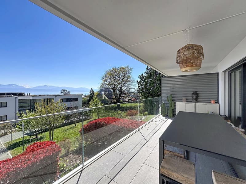 Cadre de vie privilégié : 4,5 pièces moderne avec balcon et vue exceptionnelle sur le lac (1)