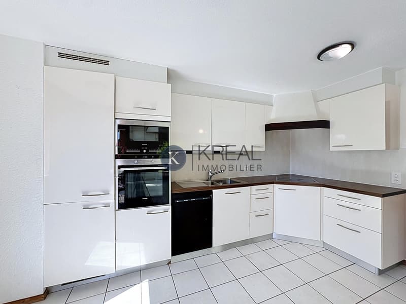 Spacieux appartement avec potentiel et espaces extérieurs uniques (2)
