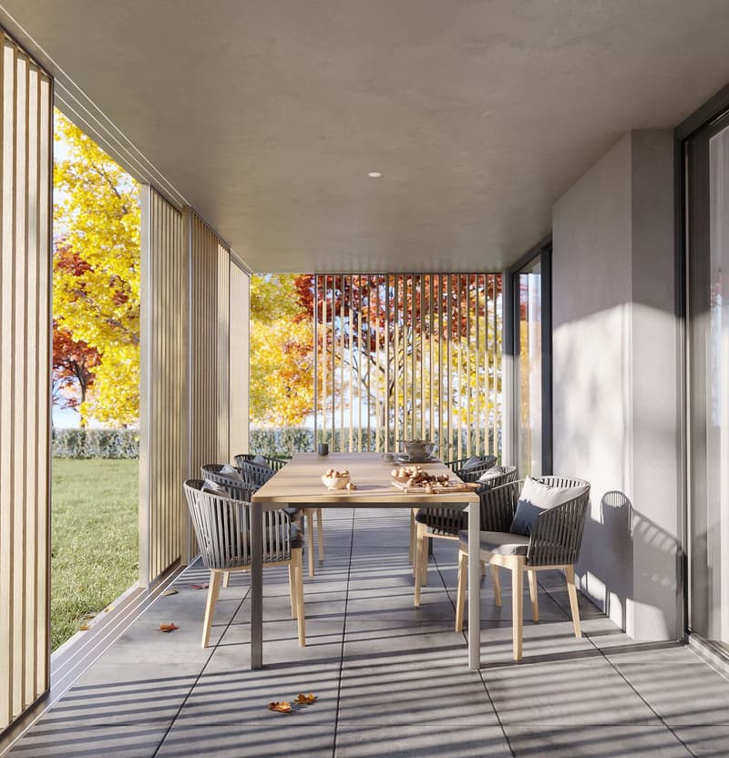 Outdoor dining table with chairs, surrounded by slatted wall