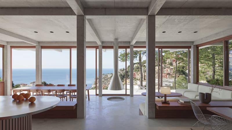 modern interior, large windows, dining table, chairs, round table, sofa, lamp, round hole in floor