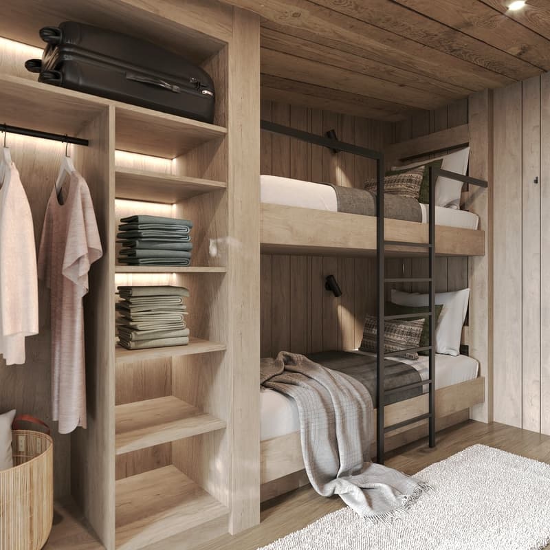 Interior with wooden floor, wooden bunk beds, wardrobe, clothes hangers, lamps, and rug