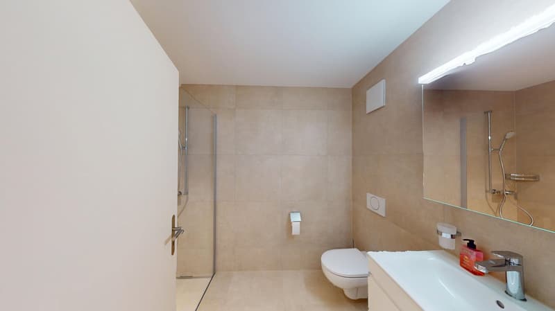 white walls, tile floor, glass shower, white toilet, white sink