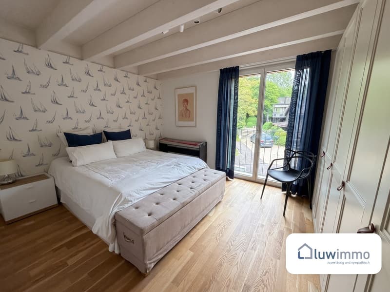 Modernes 6.5-Zimmer-Doppeleinfamilienhaus in Flüh – Raum für Familie, Arbeit und Natur (2)