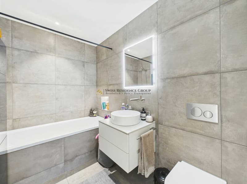 Un foyer avec ambition : appartement de jardin en construction neuve avec équipement premium (9)