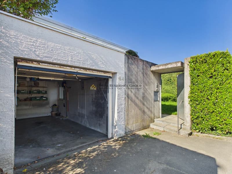 Ampia casa unifamiliare di 6 locali con idillio giardino e garage (2)