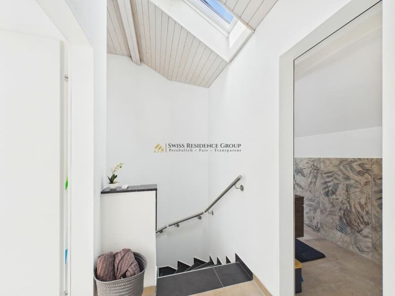 Modernes 6.5-Zimmer-Eckhaus mit sonnigem Garten in begehrter Wohnlage (15)