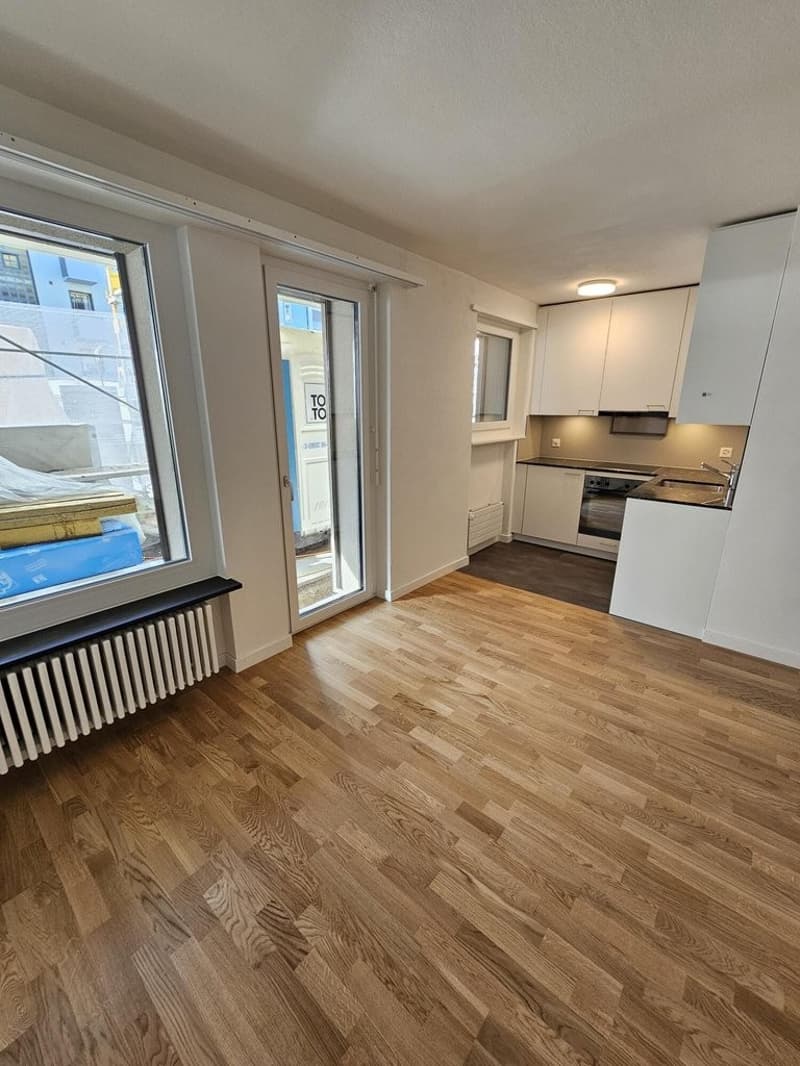 Wohnzimmer_mit_Sicht_zur_Kueche.jpg