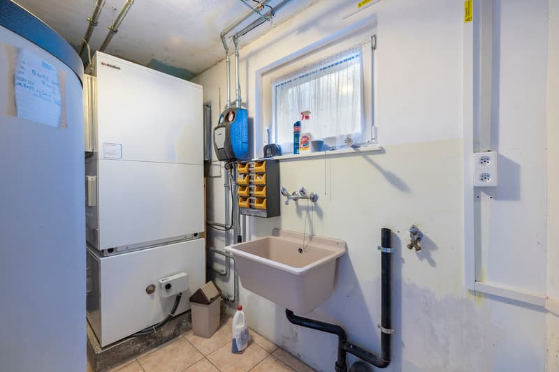 Villa 6.5 pièces avec grand jardin, vue dégagée et potentiel locatif (13)