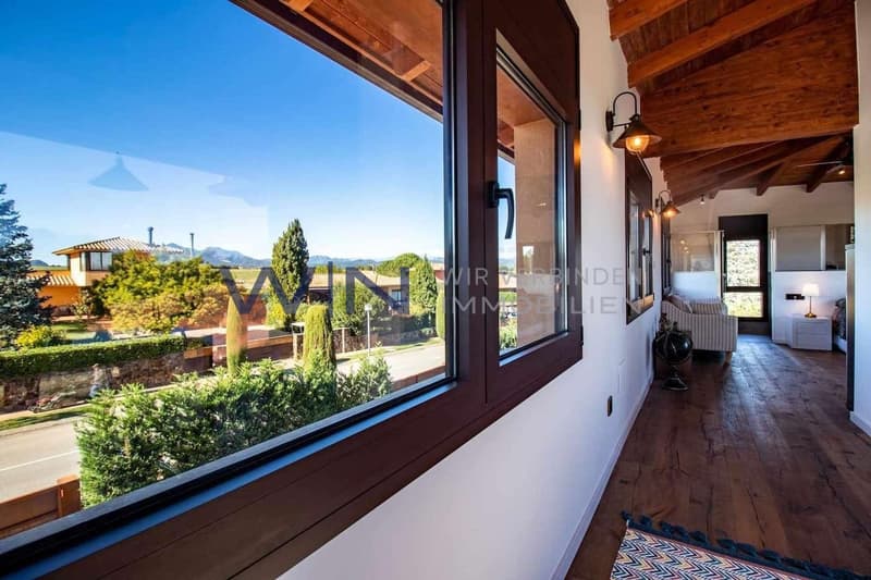 The interior part of the house is distributed over two floors