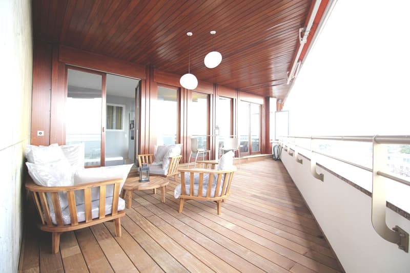 wooden floor, wooden ceiling, wooden chairs, table, lamps, glass doors, view