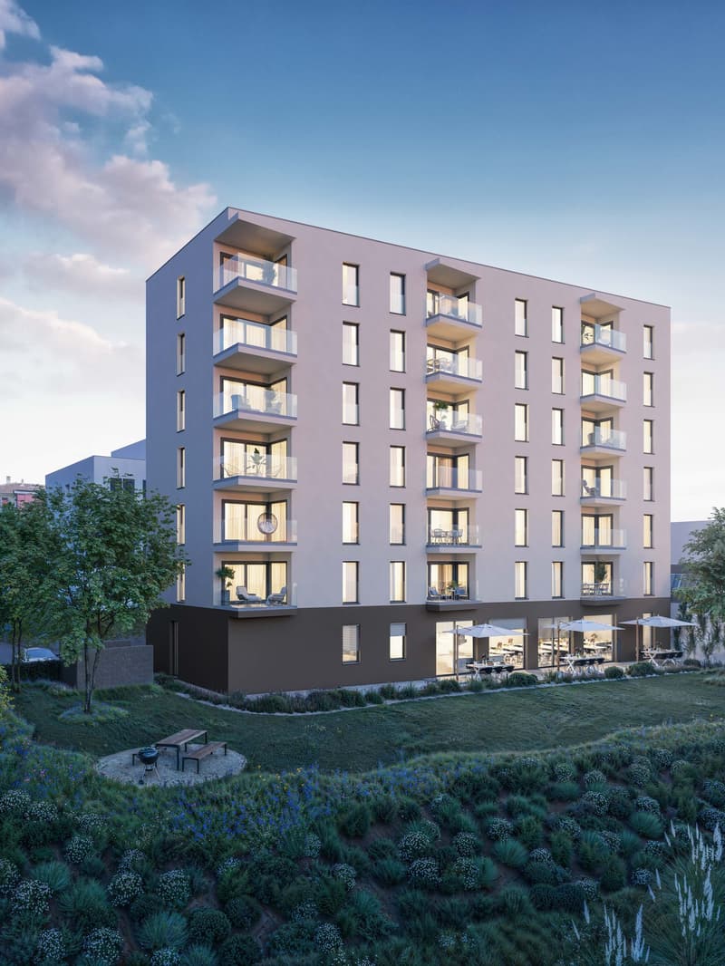 5 story residential building, brown base, white upper part, glass windows, balconies, green space, trees