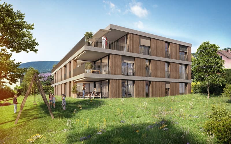 3-story modern residential building with balconies and a landscaped garden