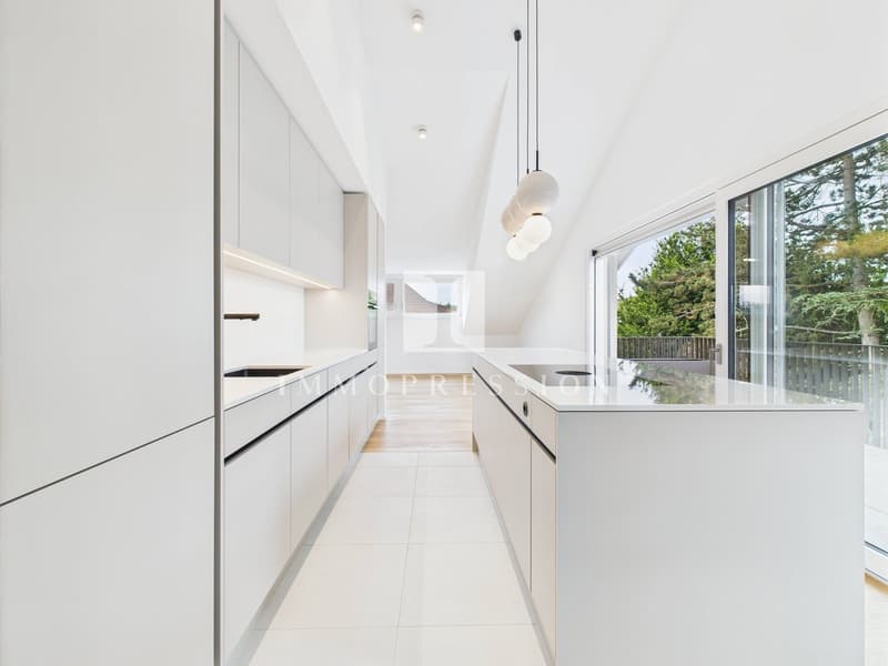modern kitchen, white cabinets, white countertops, white tiled floor, large windows, balcony