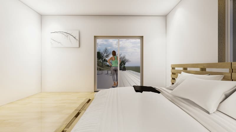 Bedroom with balcony view to the outside