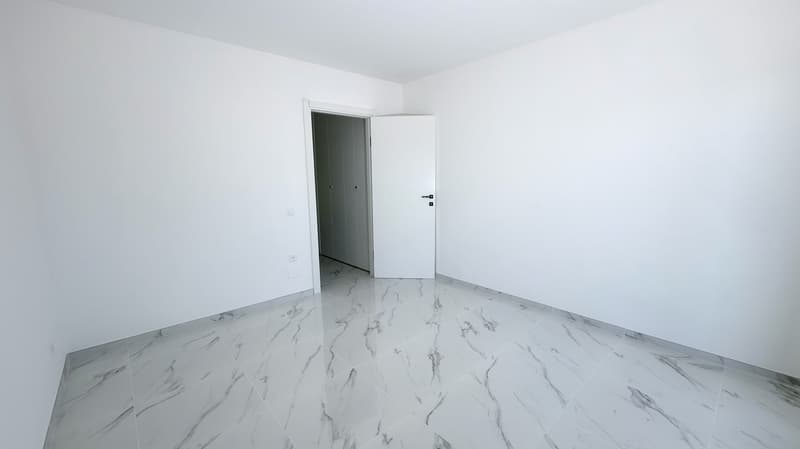 Lugano-Breganzona: elegante 3.5 locali di 105 m², ristrutturato a nuovo con terrazzo (12)