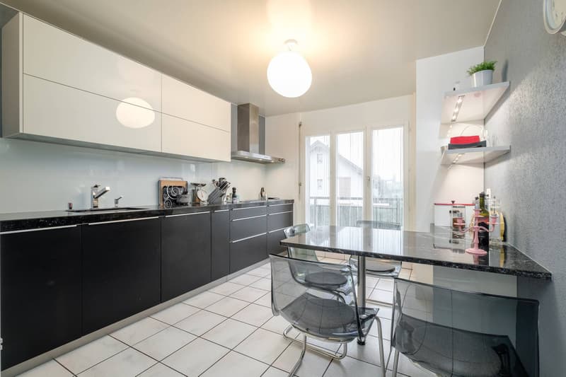 Spacieux duplex en attique de 235 m² entièrement rénové (4)