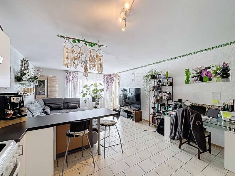 Élégant 2.5 pièces avec balcon dans un cadre paisible (2)