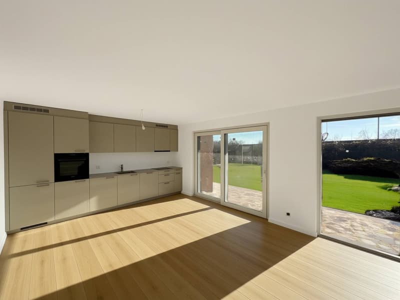 Appartement de 3.5 pièces neuf au rez-de-chaussée avec terrasse (1)