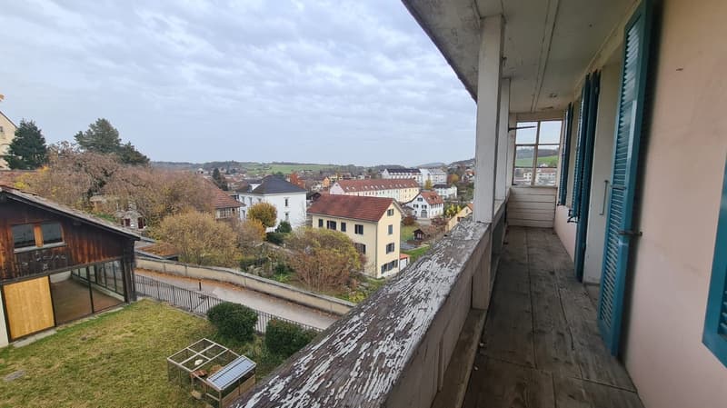 wooden balcony, wooden floor, city view, surrounding houses