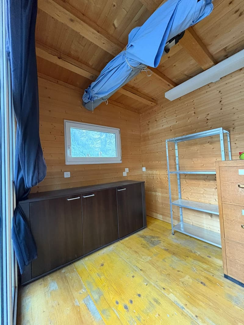 wooden floor, wooden wall, window, cupboard, open shelves, hanging items
