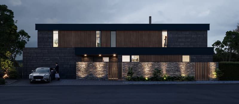 2-story modern house with a dark exterior, wooden siding, large windows, and a stone wall feature. The house has a garage and a parking space in the front. The exterior is well-lit with outdoor lighting.
