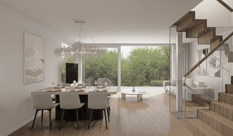 Dining room with a large table, chairs, chandelier, and a glass wall leading to a balcony with a view of trees.