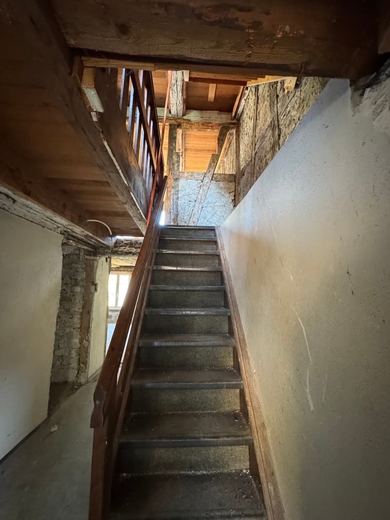 Inside stairs leading to upper floors