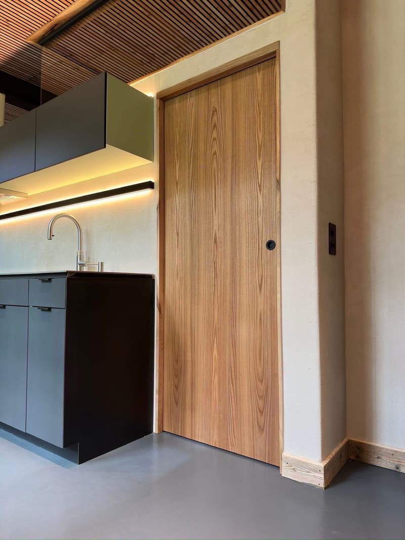 modern kitchen design, wooden door, under-mount sink, contemporary cabinets, recessed lighting