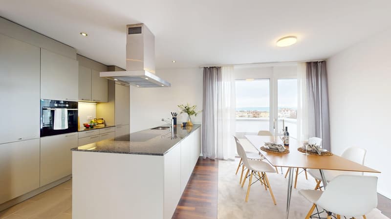 modern kitchen with island, granite countertop, stainless steel appliances, white cabinets, dining area with large windows, balcony, view