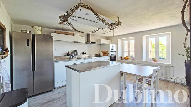 Duplex avec combles aménagés entièrement rénové à Cremin (Lucens) (3)