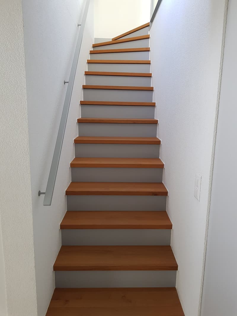 wooden steps, gray and brown color, metal handrail
