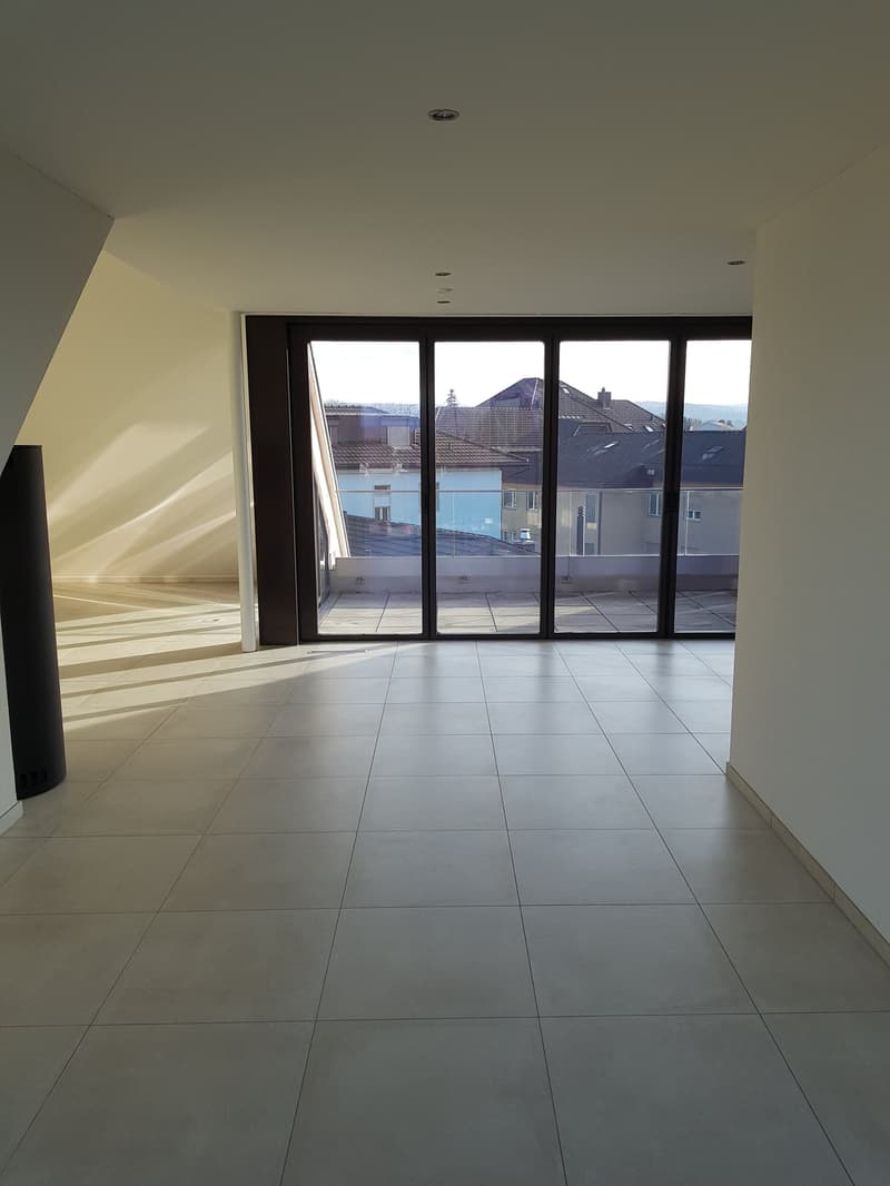 empty room, large windows, balcony, tiled floor, white walls