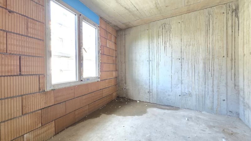 empty room, brick wall, concrete wall, window, unfinished floor