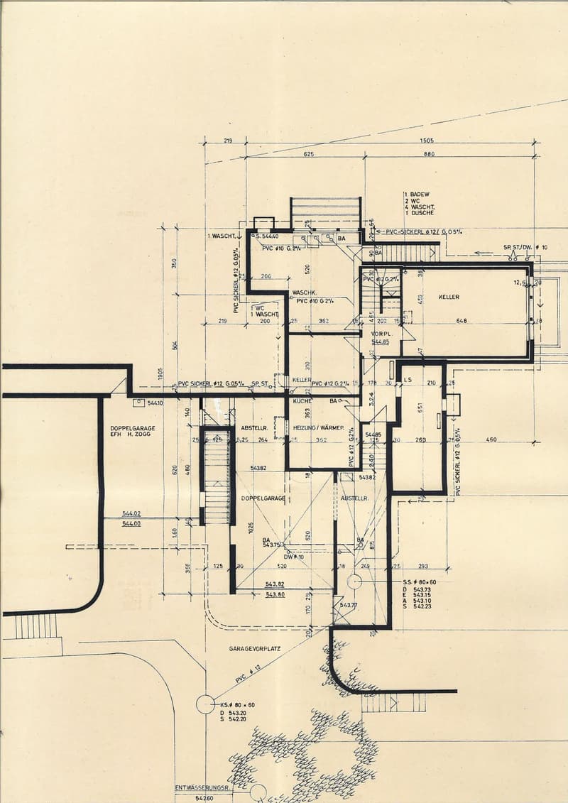 Floor plan with living room, kitchen, 2 bedrooms, 2 bathrooms, double garage, balcony, and heating/warmer area