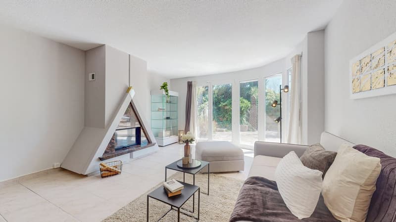 fireplace, sofa, coffee tables, ottoman, rug, plants, floor lamp, glass walls, balcony, basket