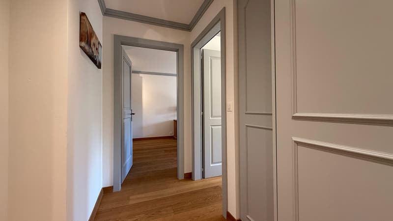 Couloir donnant accès aux chambres / Corridor leading to bedrooms / Corridoio che conduce alle camere da letto