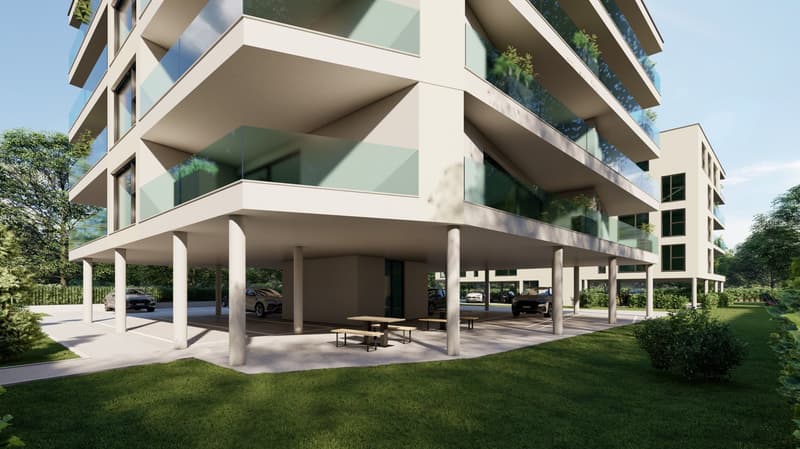 Modern apartment building, glass balconies, concrete floor, car parking area, wooden tables and benches