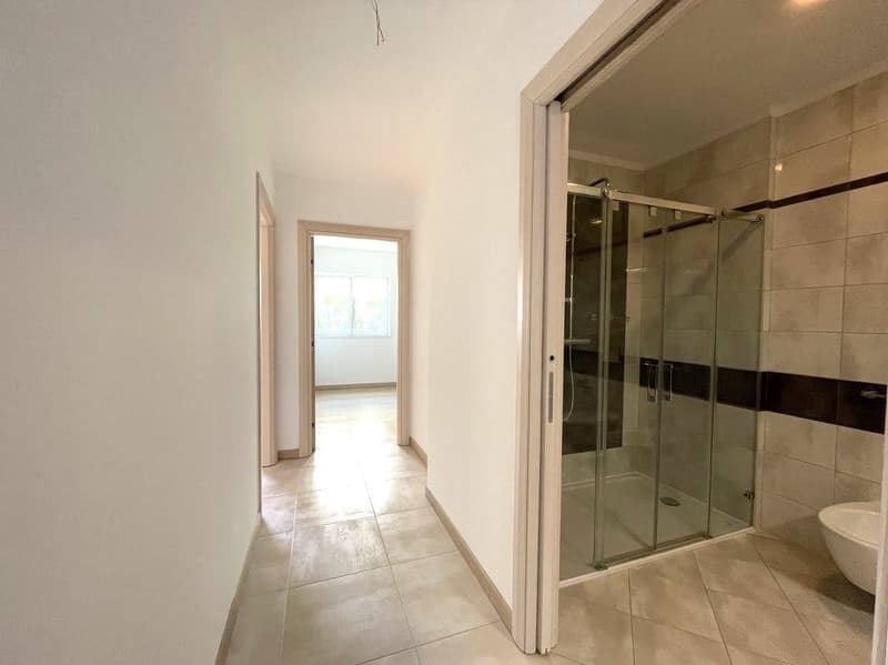 APPARTAMENTO 3.5 LOCALI CON AMPIA TERRAZZA E VISTA APERTA (7)