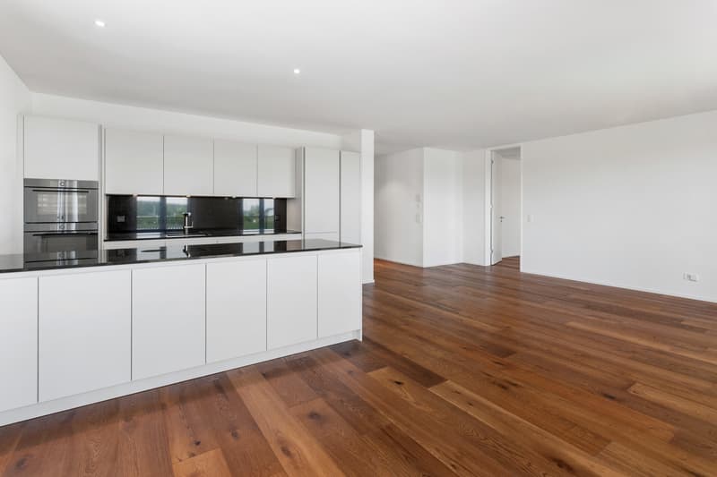 Offene Küche mit modernem Design und viel Platz zum Geniessen