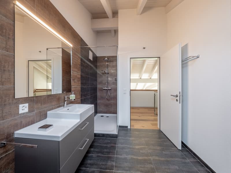 Attique 5.5 pièces avec grande terrasse et dégagement – 198 m² habitables (13)