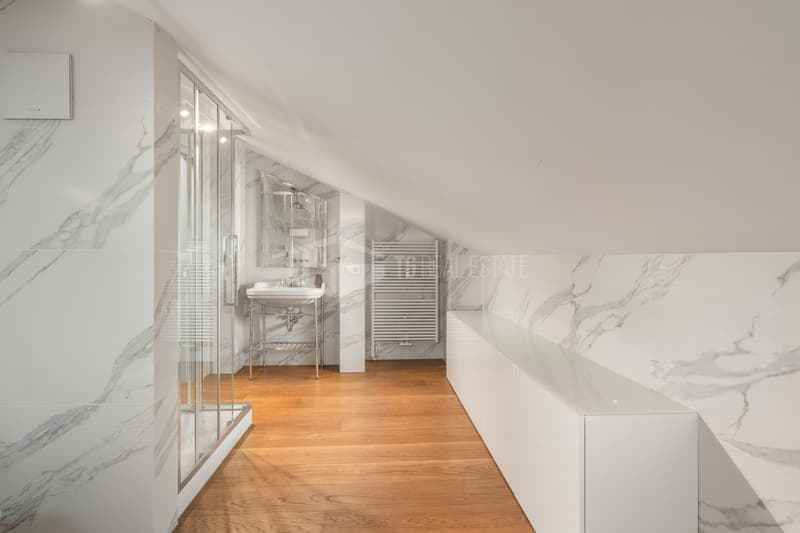 LUXUS UND KOMFORT: 6,5 ZIMMER PENTHOUSE-WOHNUNG MIT PANORAMABLICK AUF LUGANO (5)