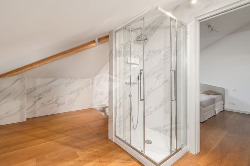 LUXUS UND KOMFORT: 6,5 ZIMMER PENTHOUSE-WOHNUNG MIT PANORAMABLICK AUF LUGANO (4)