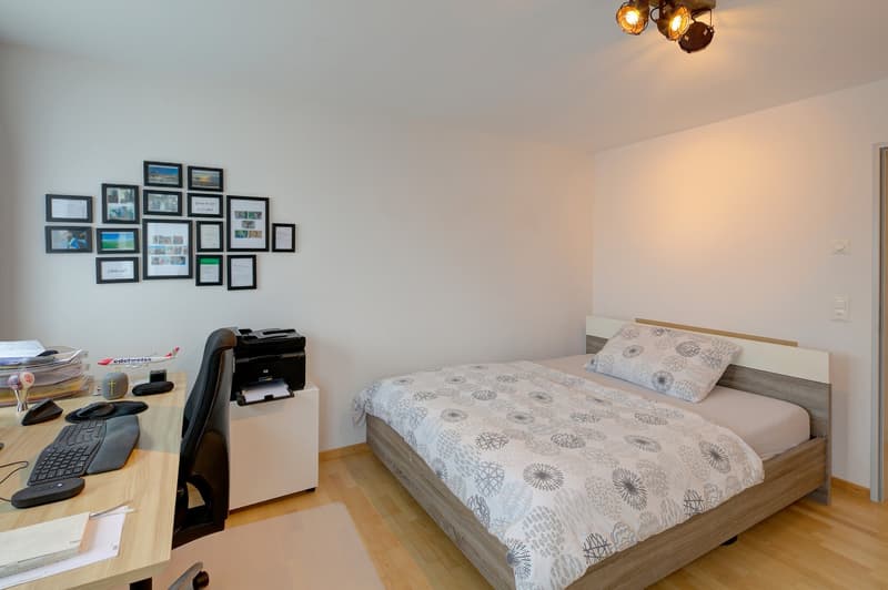 Desk, keyboard, mouse, bed, printer, rug, picture frames