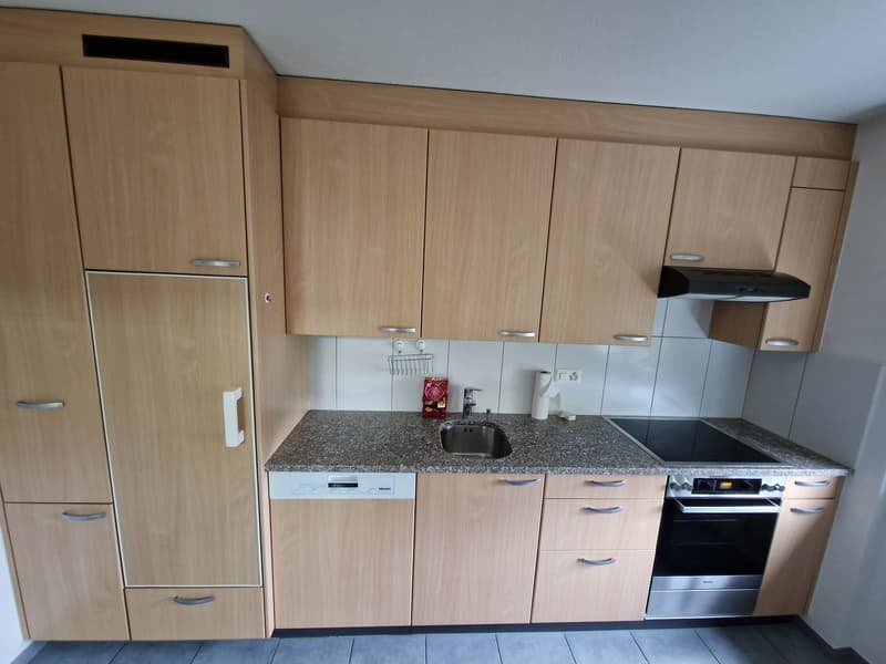 Granite countertops, stainless steel appliances, wooden cabinets, dishwasher, stove, sink, faucet