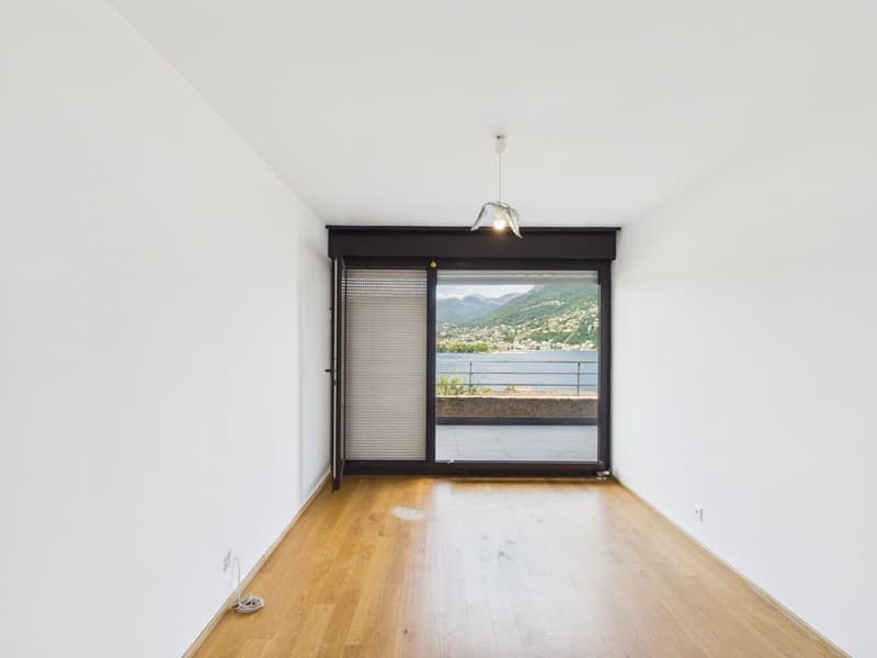 Panoramawohnung mit traumhaftem Blick auf den Golf von Lugano (15)